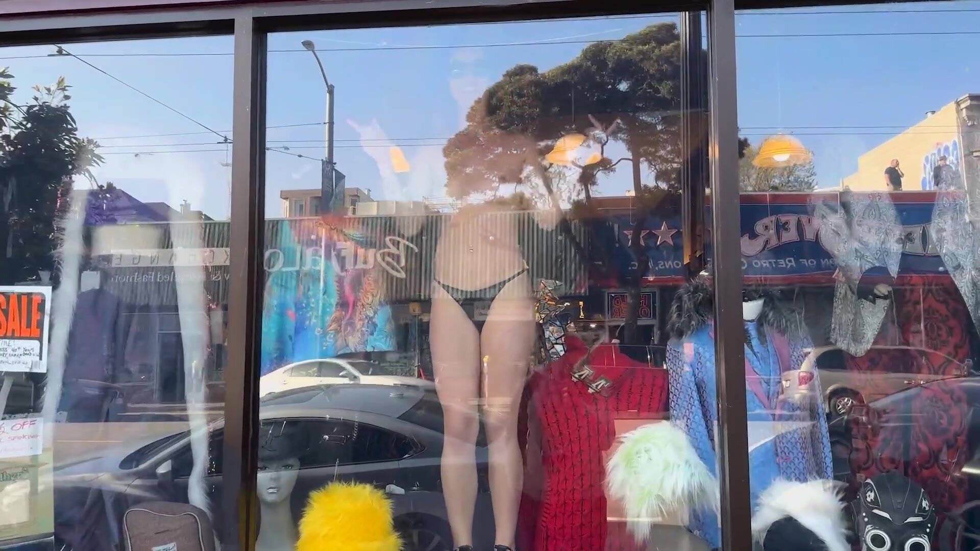 Dancing naked in a shop window!