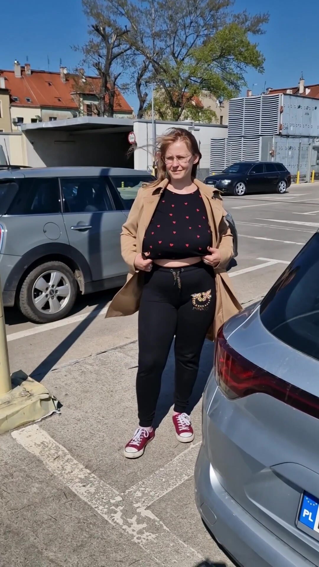 Surveillance cameras, cars, people - showing your tits in shopping mall parking lots is always fun. Heh