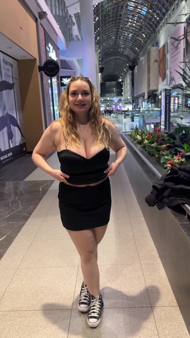 Flashing my young tits in a huge mall