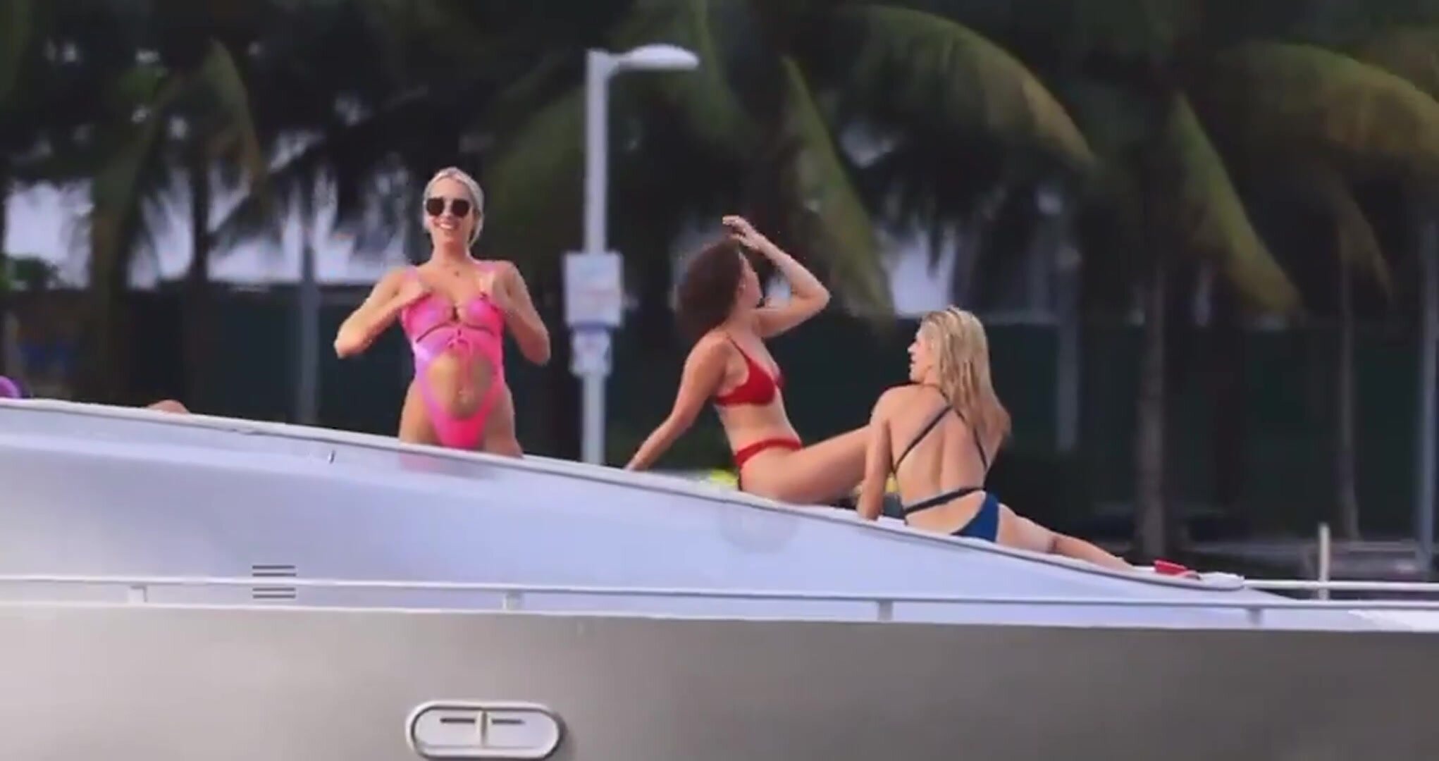 Flashing her tits from the yacht