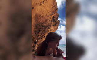 Sensual public blowjob on an incredibly beautiful beach.