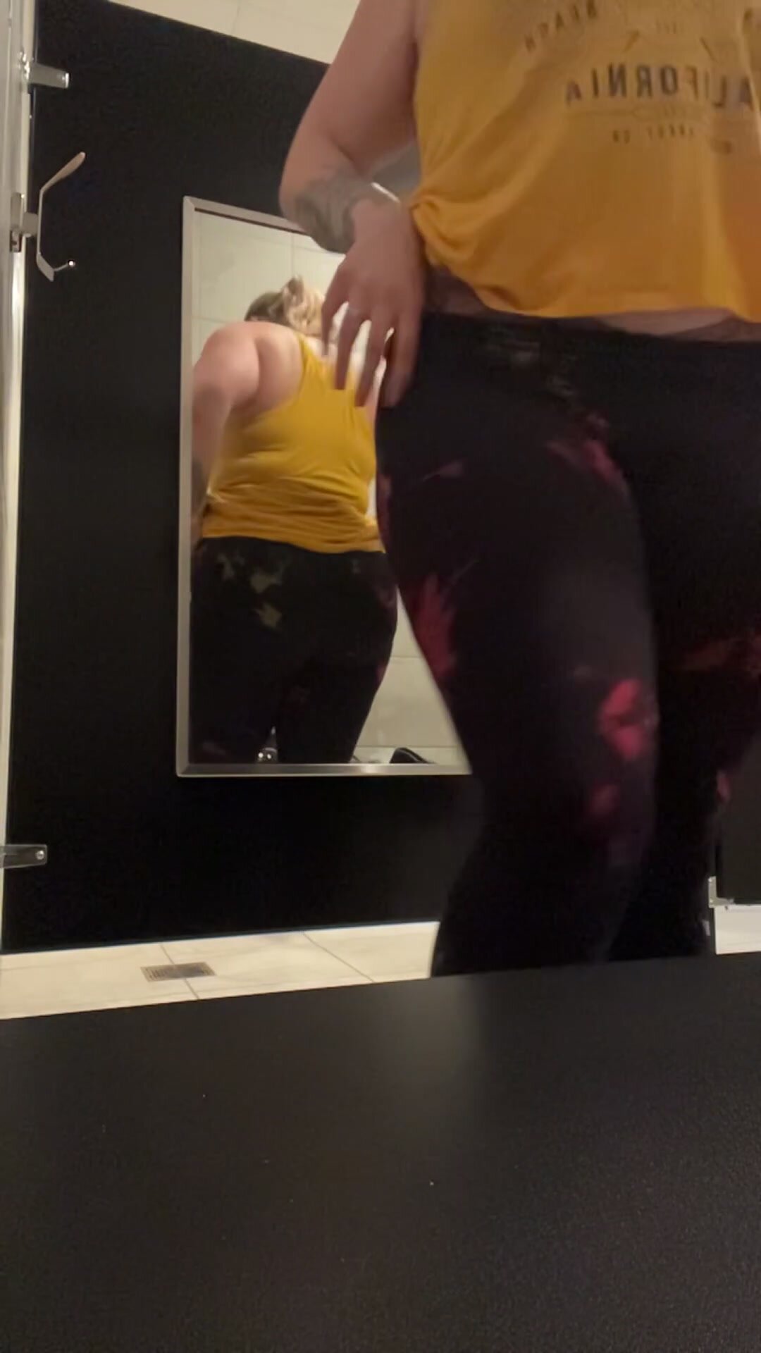 Stripping down in the locker room after a sweaty workout