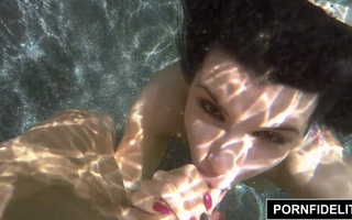 Wild fuck right in a pool with perfect busty Brunette Romi Rain