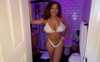 Busty hottie blows and strokes her boyfriend's hard boner in a hot bathtub