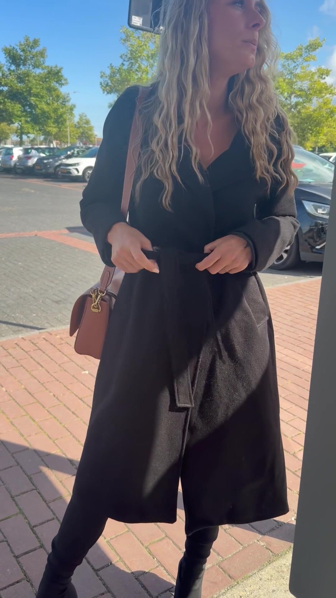 MILF waiting at a bus stop