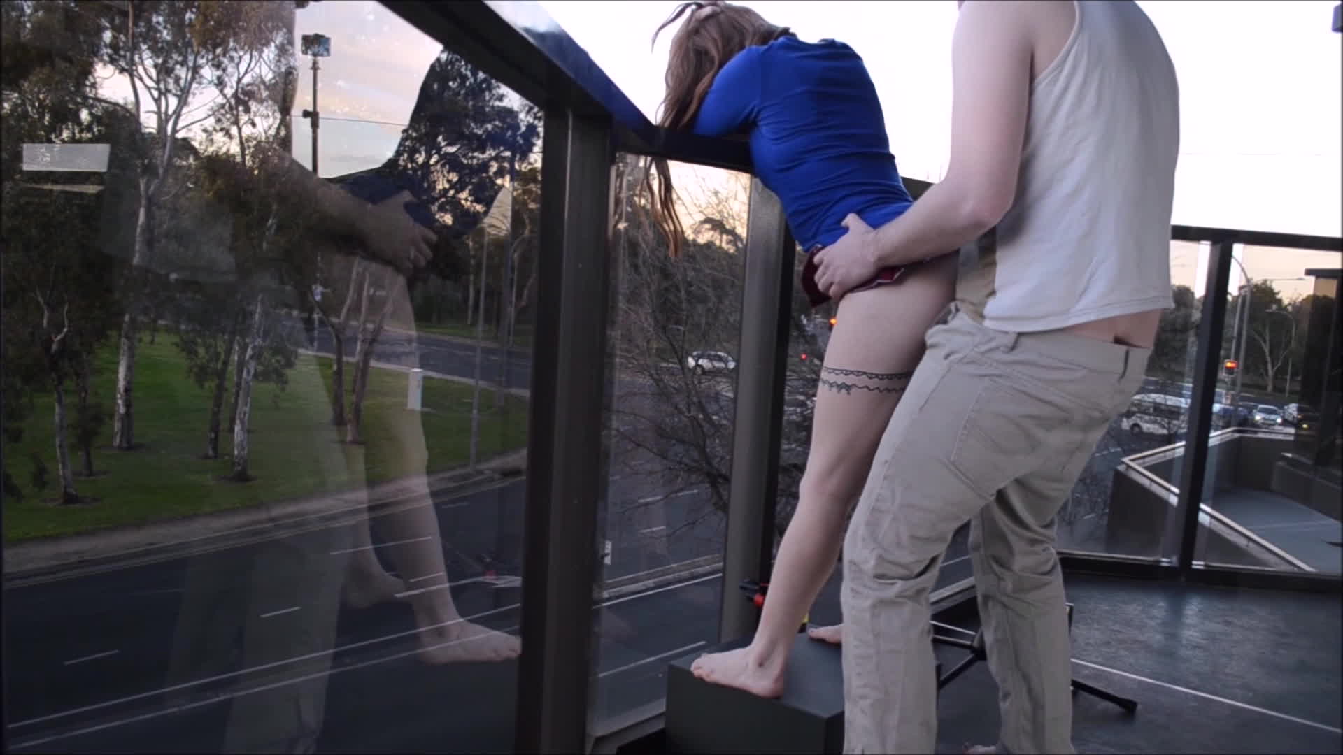 Fucking his petite GF on the balcony