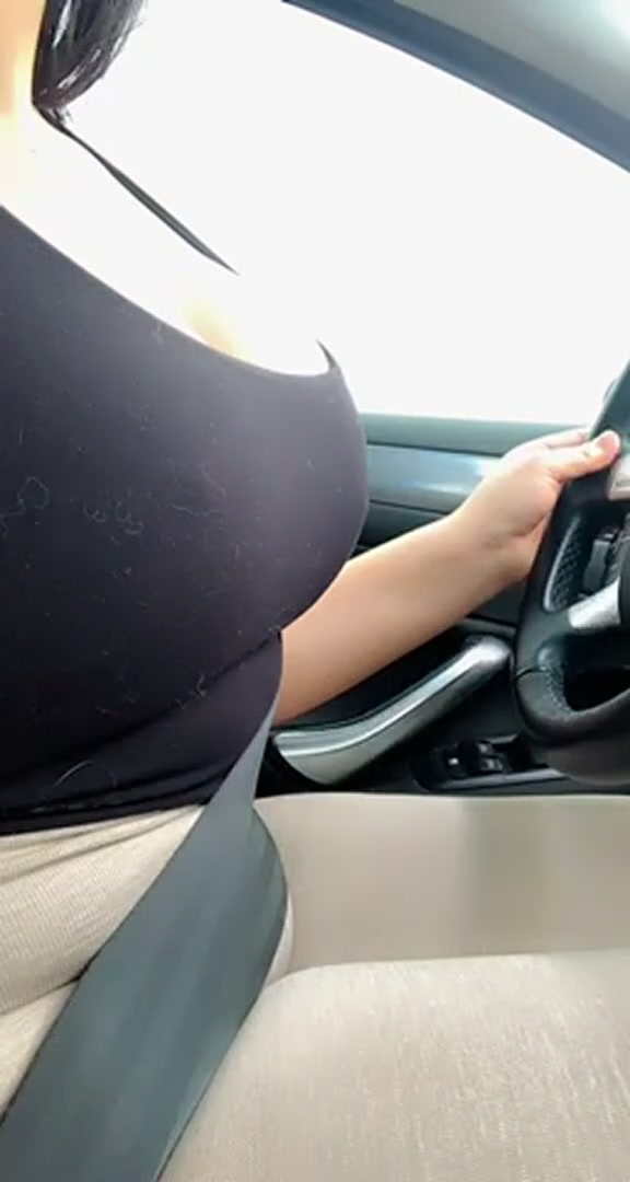 I feel like a naughty slut when I flash my big tits in the car