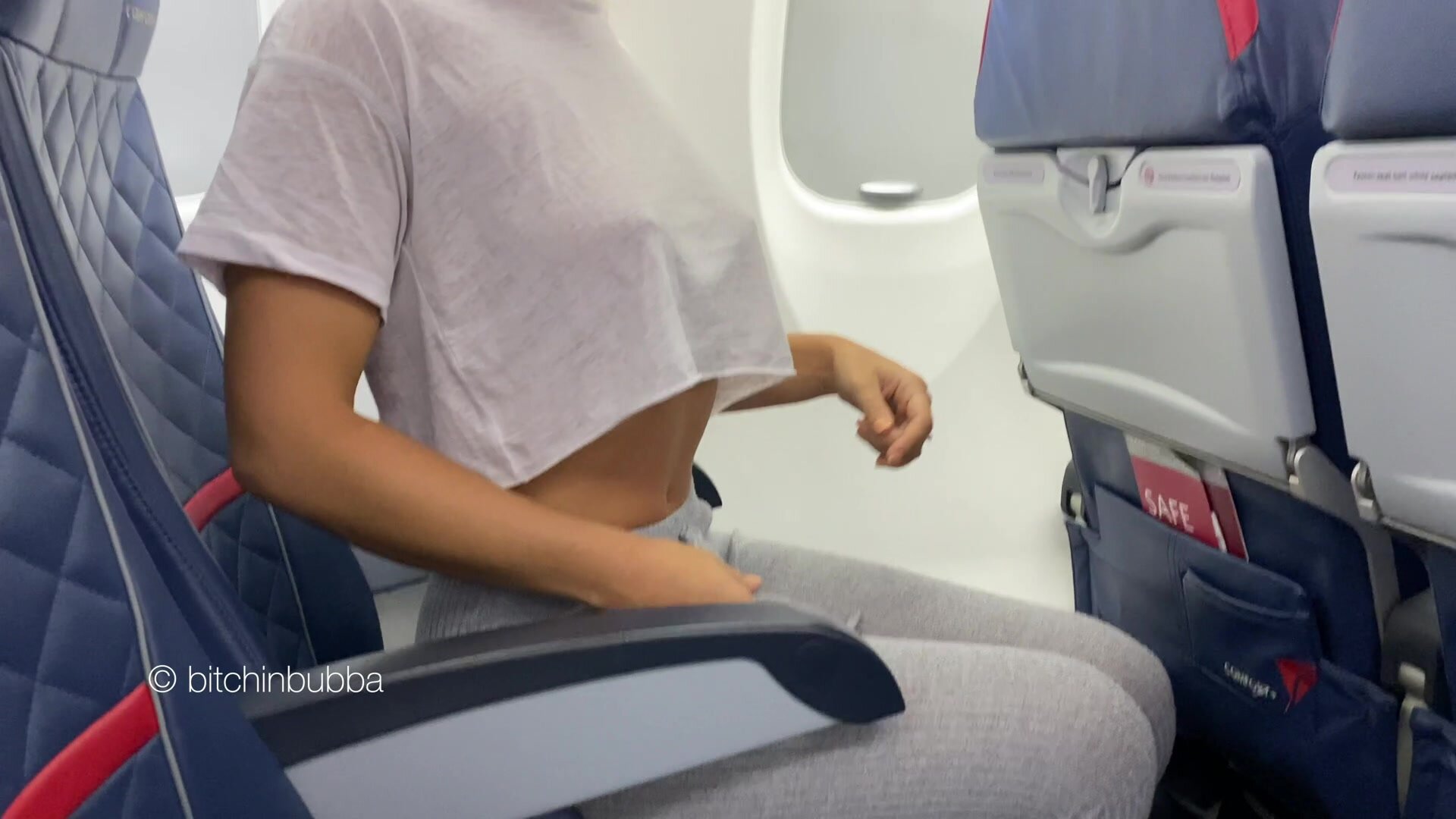 Showing off my boobs on the plane