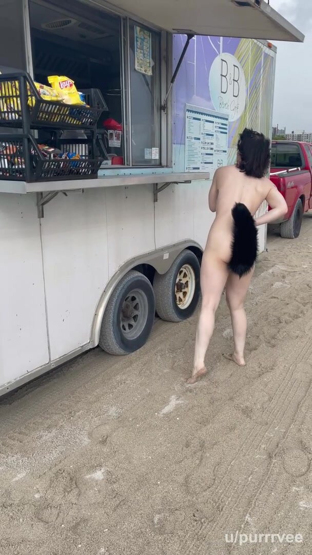 Wearing my tail on the beach