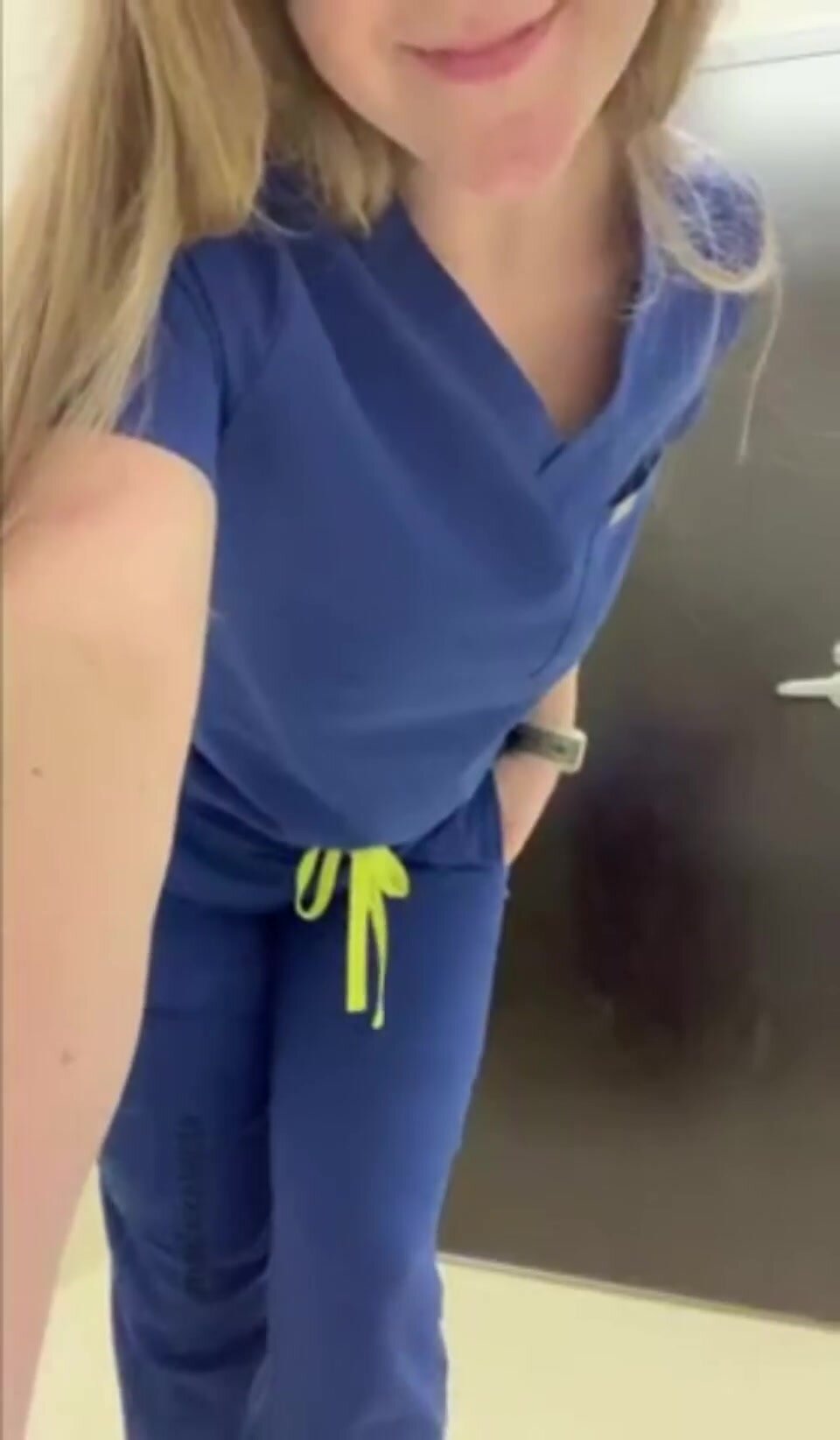 Nurse with her butt plug at work