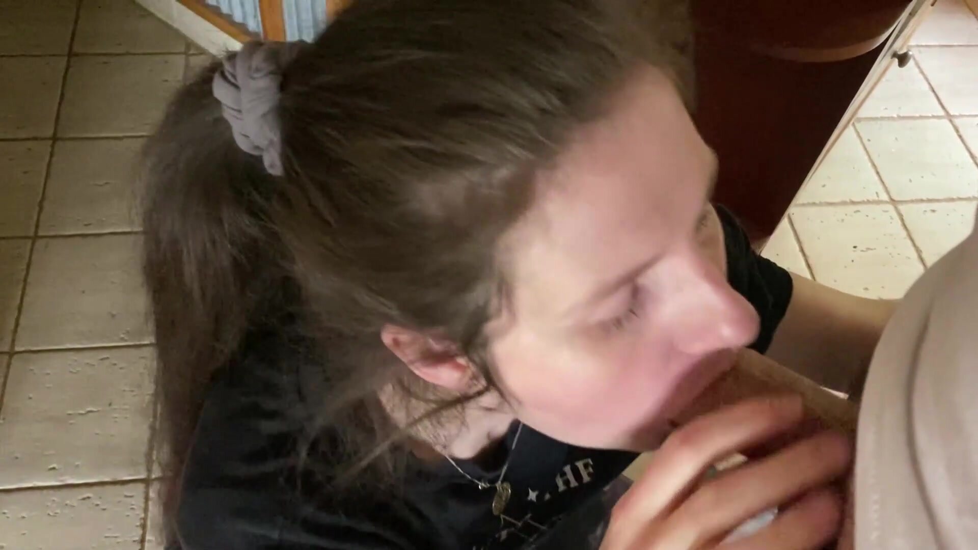 Blowing him in the kitchen